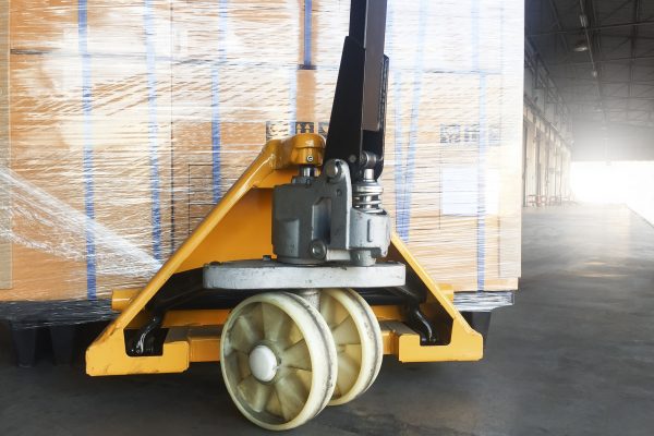 a warehouse trolley pushing the delivered parcel to Malaysia